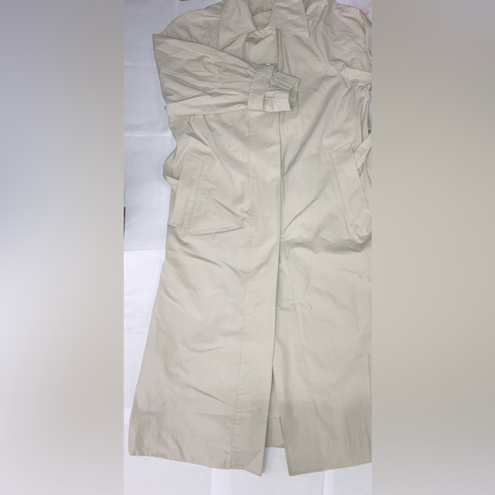 Vietnamese trench coat. Good condition, and well made.